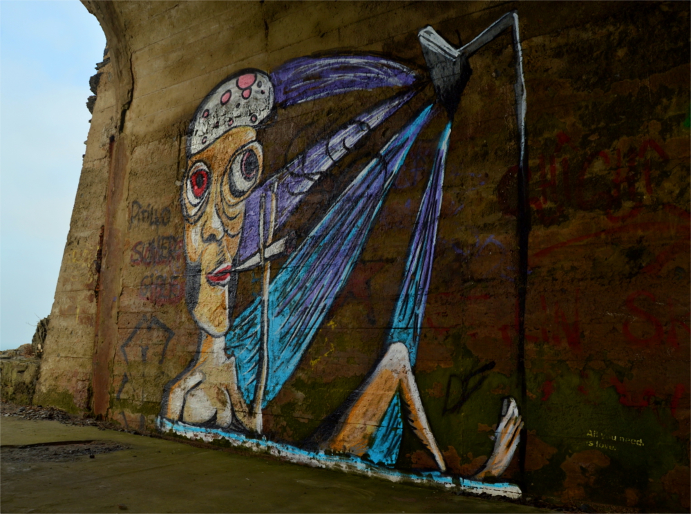 Caricatura de John Lennon en un túnel del Faro de Meirás
